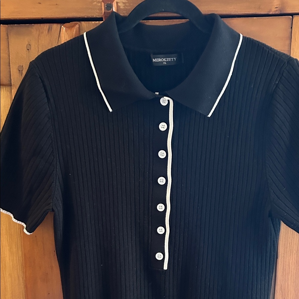 Classic Black Polo Dress with White Accents - Picture 3 of 7
